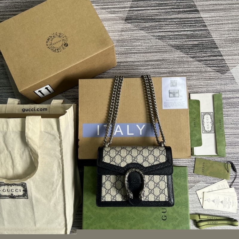 G*u*i top handle bags
